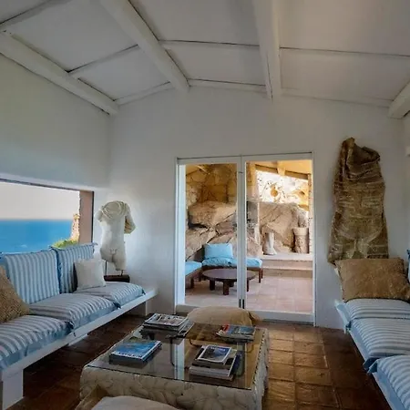Apartment Designer Among Rocks, Art And Endless Blue