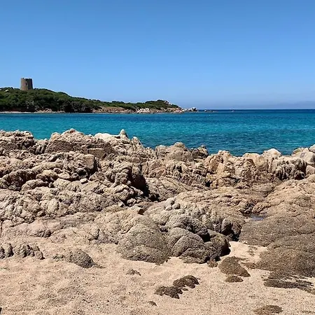 Designer Among Rocks, Art And Endless Blue Costa Paradiso