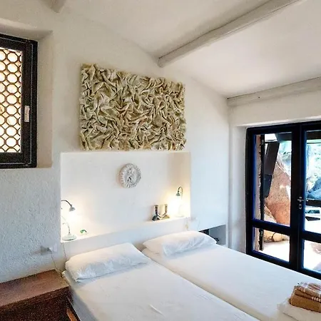 Apartment Designer Among Rocks, Art And Endless Blue
