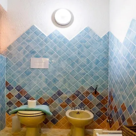 Apartment Designer Among Rocks, Art And Endless Blue