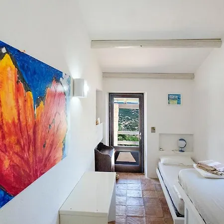 Designer Among Rocks, Art And Endless Blue Costa Paradiso